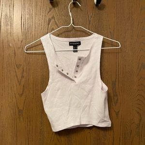Cropped white cropped top with buttons. from urban planet and a size medium
